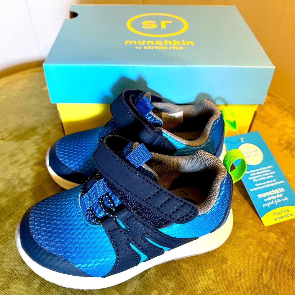 Navy/Light blue sneakers with Velcro closure. New in box